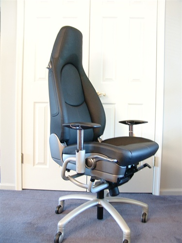 Illustration for article titled Race Car Chairs Give You Office Pole Position